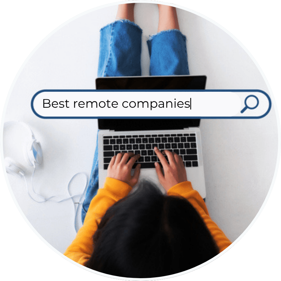 Person researching remote companies on a laptop